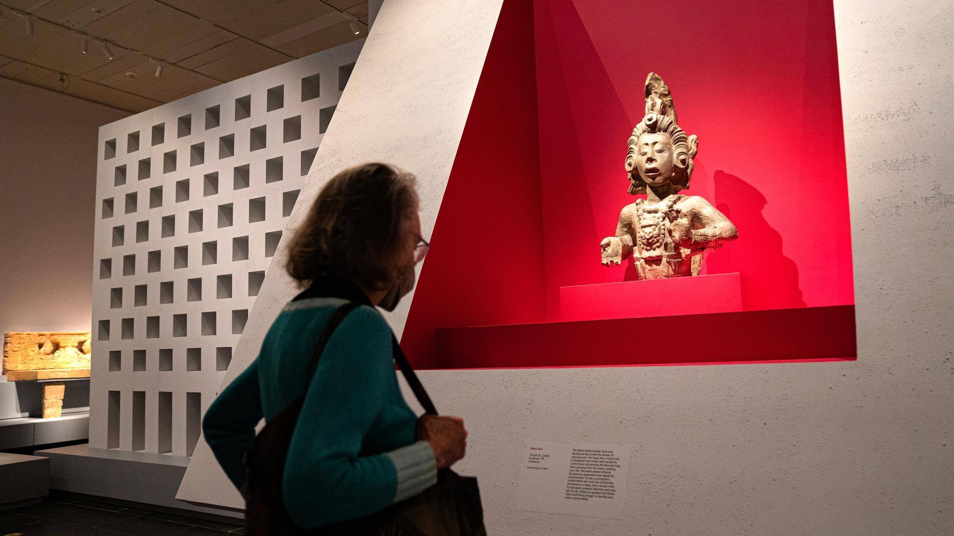 An exhibit at the Met shows Mayan artists signing their sculptures