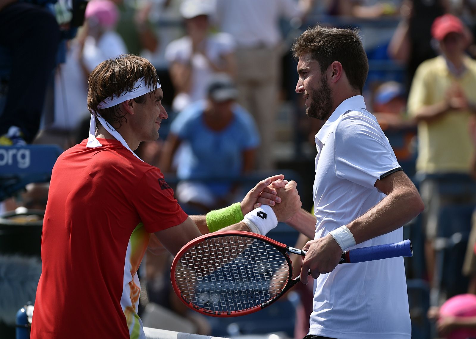Gilles Simon y David Ferrer se saludan después del partido.