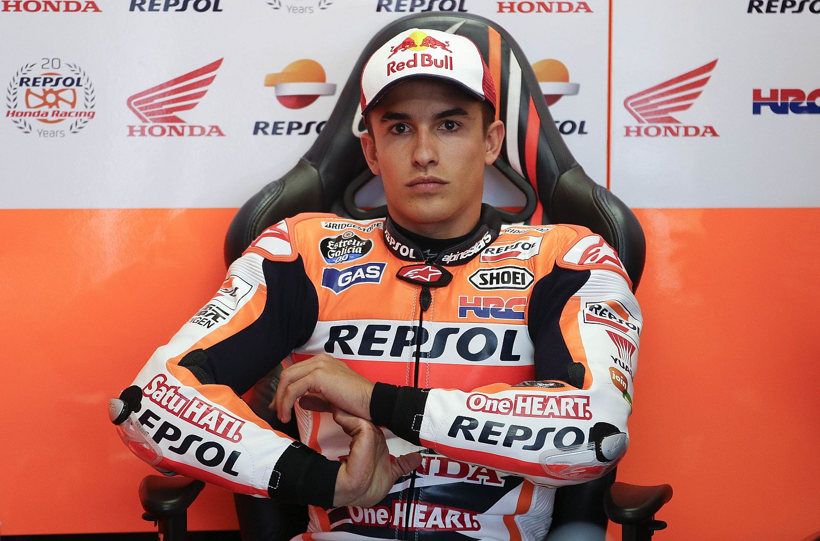 Honda MotoGP rider Marquez of Spain stretches his hands during the second practice session of the San Marino Grand Prix in Misano Adriatico circuit in central Italy