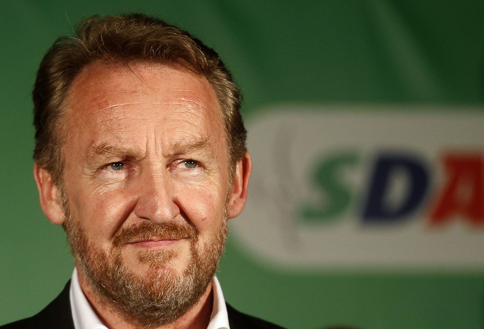 Izetbegovic of the SDA party attends a news conference after being declared the winner for the Bosniak (Muslim) member of the Tripartite Bosnian Presidency, in Sarajevo