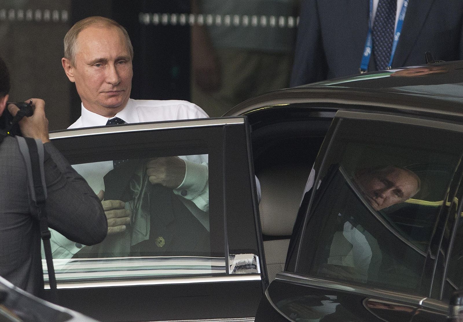 Russian President Vladimir Putin leaves his hotel en route to Brisbane Airport as he leaves the G20 leaders summit early in Brisbane