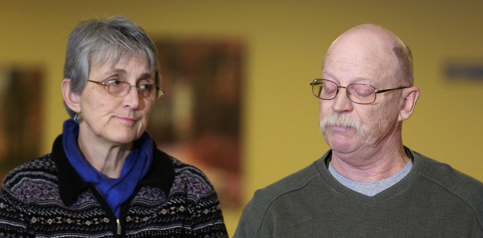 Paula and Ed Kassig, parents of U.S. aid worker Peter Kassig, pause while reading a statement while speaking to the press in Indianapolis