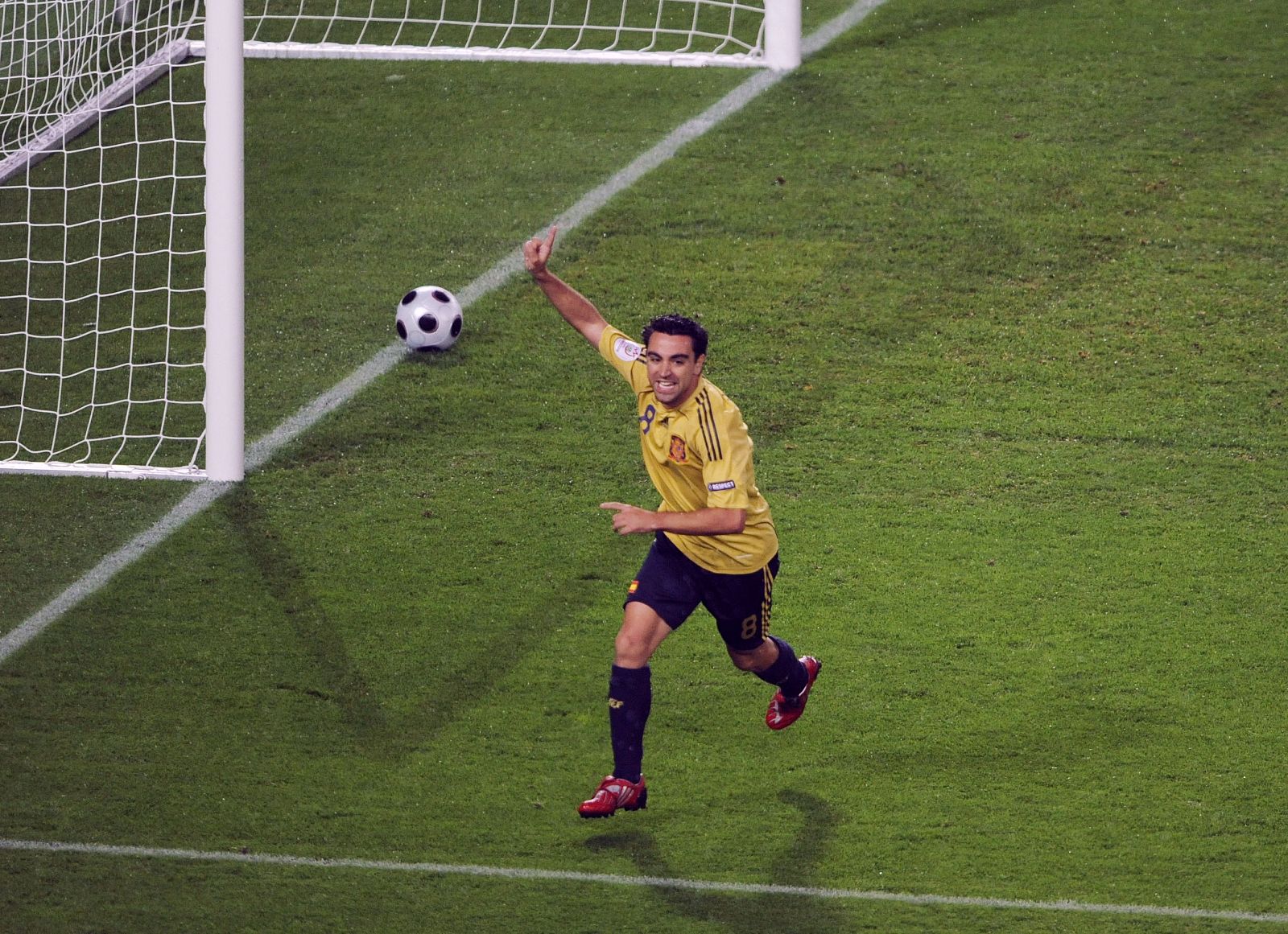 Spain's Xavi celebrates his goal during their Euro 2008 semi-final soccer match against Russia in Vienna