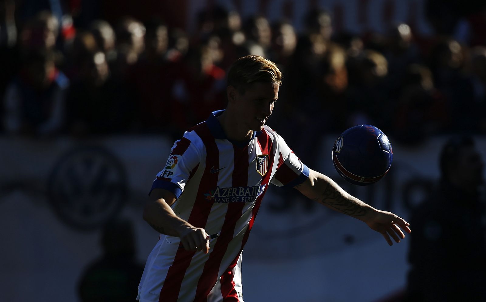 Spain forward Fernando Torres kicks the ball during his presentation ceremony at Vicente Calderon stadium in Madrid