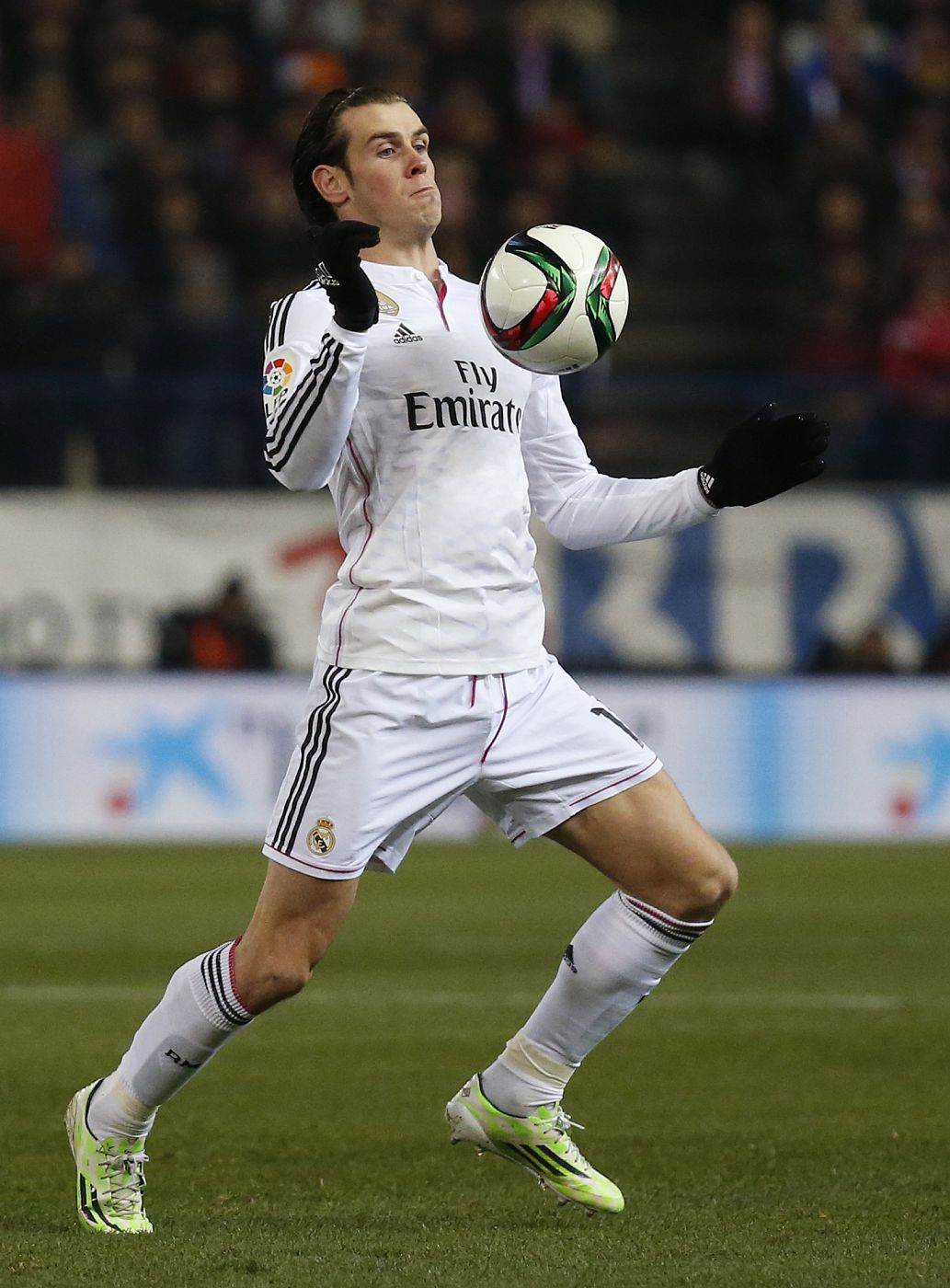 Real Madrid's Gareth Bale controls the ball during their Spanish King's Cup soccer match against Atletico Madrid at Vicente Calderon stadium in Madrid
