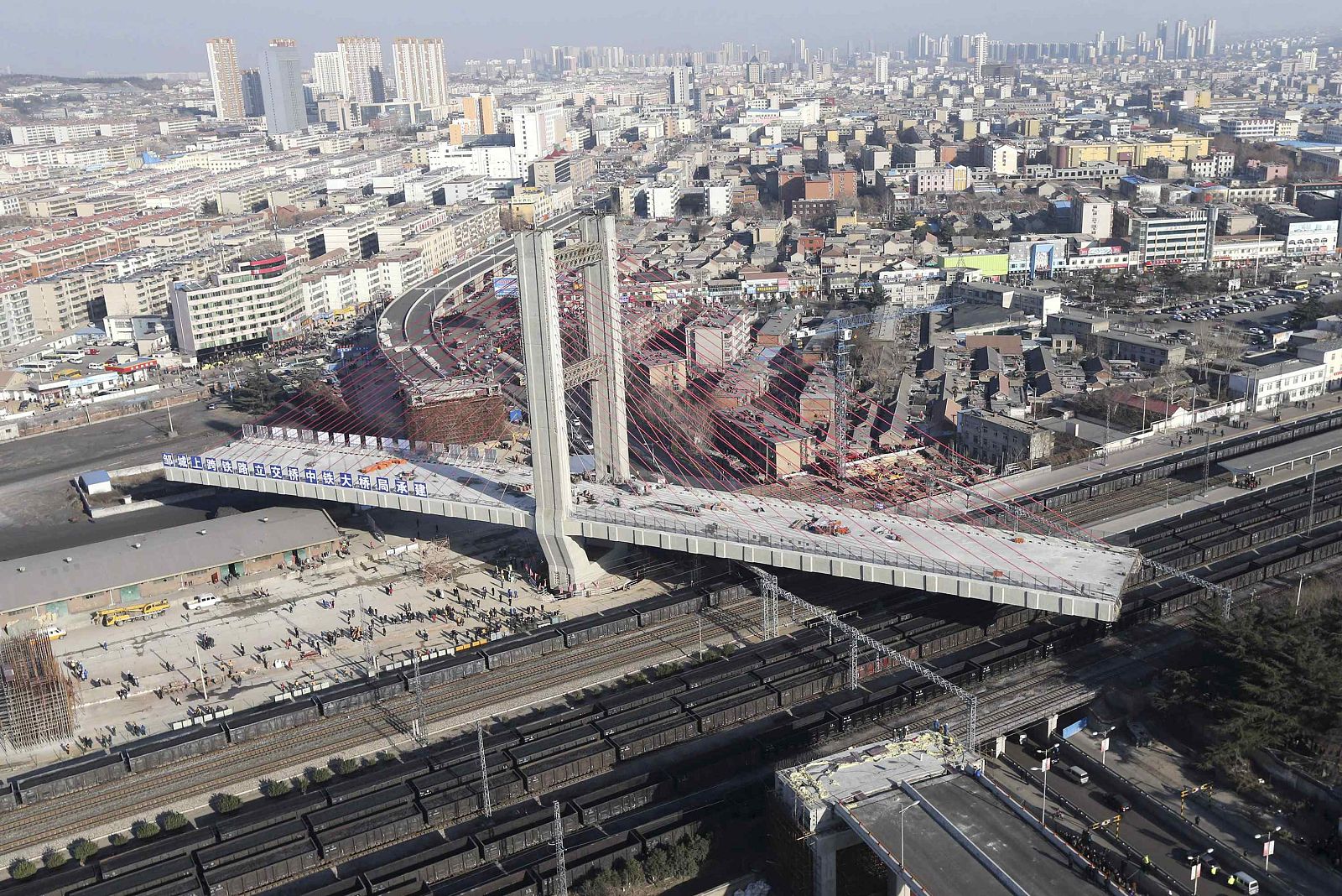 Part of an overpass under construction is turned around in Zoucheng, Shandong province
