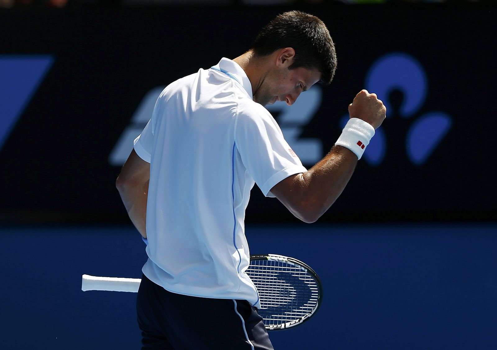 Djokovic of Serbia celebrates after defeating Kuznetsov of Russia in their men's singles second round match at the Australian Open 2015 tennis tournament in Melbourne