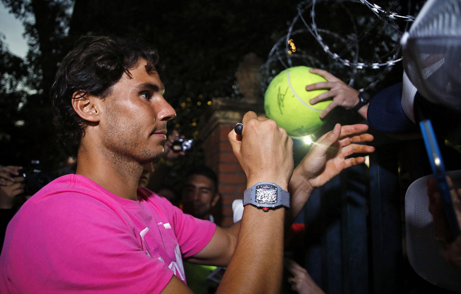Spain's Rafael Nadal signs autographs during an interview with Reuters after he won the ATP Argentina Open in Buenos Aires