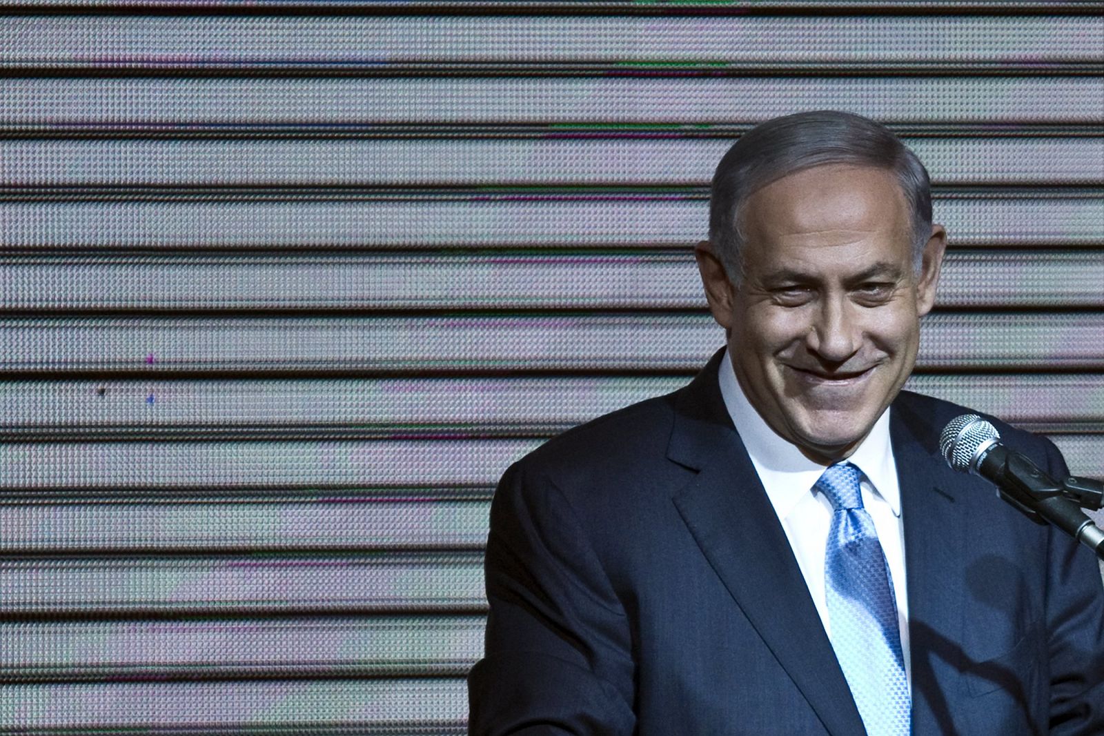 Israeli Prime Minister Benjamin Netanyahu delivers a speech to supporters at party headquarters in Tel Aviv