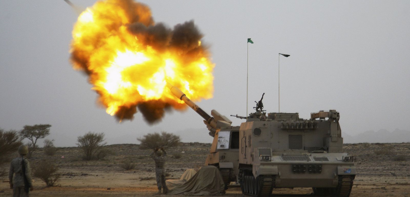 Saudi army artillery fire shells towards Houthi movement positions at the Saudi border with Yemen