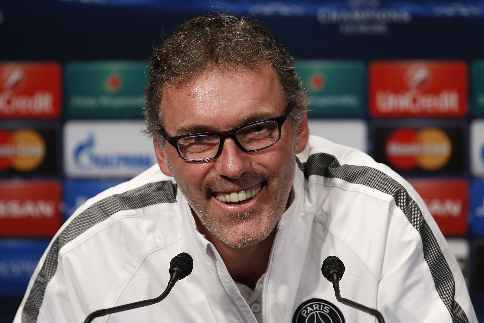 Paris St Germain's head coach Laurent Blanc attends a news conference at the Parc des Princes stadium in Paris