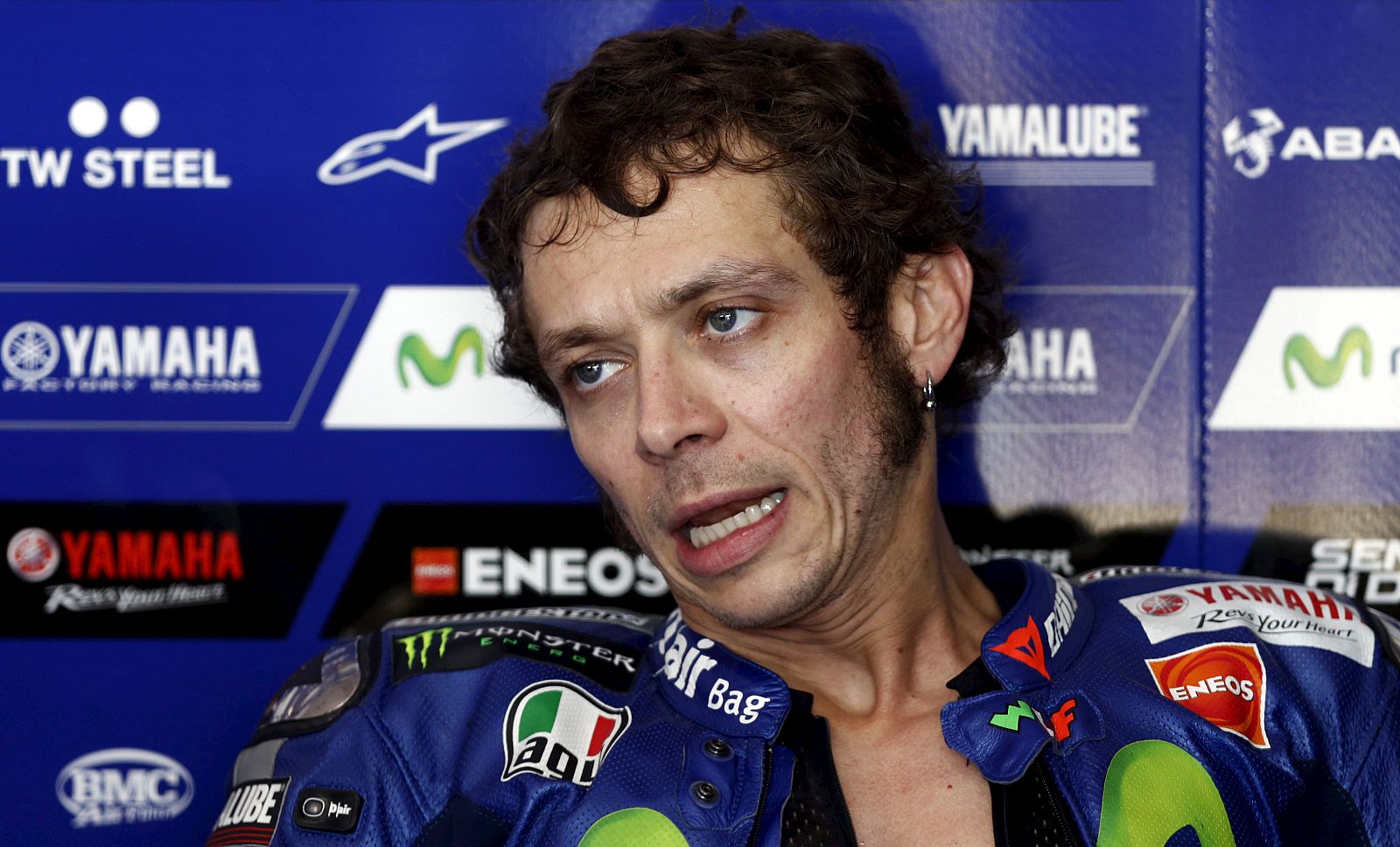 Yamaha MotoGP rider Rossi of Italy speaks inside his box at the end of a free practice session at Argentina's MotoGP Grand Prix at the Termas de Rio Hondo International circuit in Termas de Rio Hondo