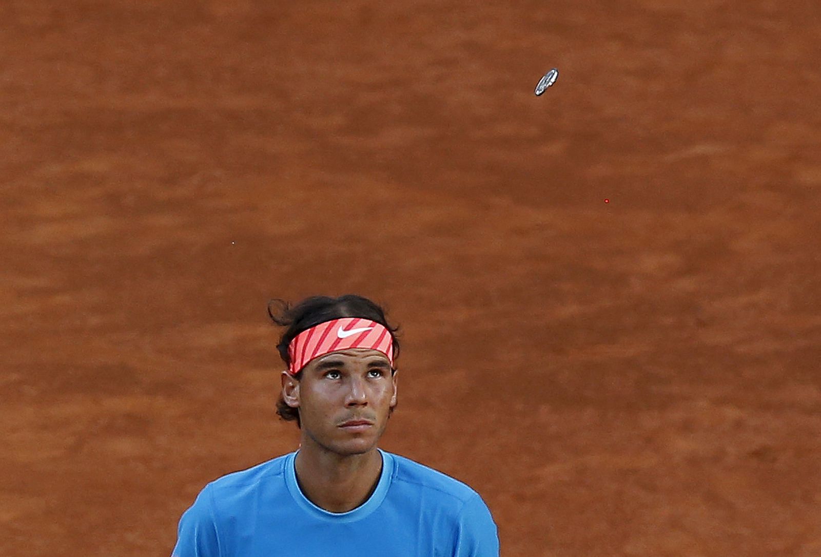 Spain's Rafael Nadal looks up during the coin toss before his final match against Britain's Andy Murray at the Madrid Open tennis tournament in Madrid, Spain