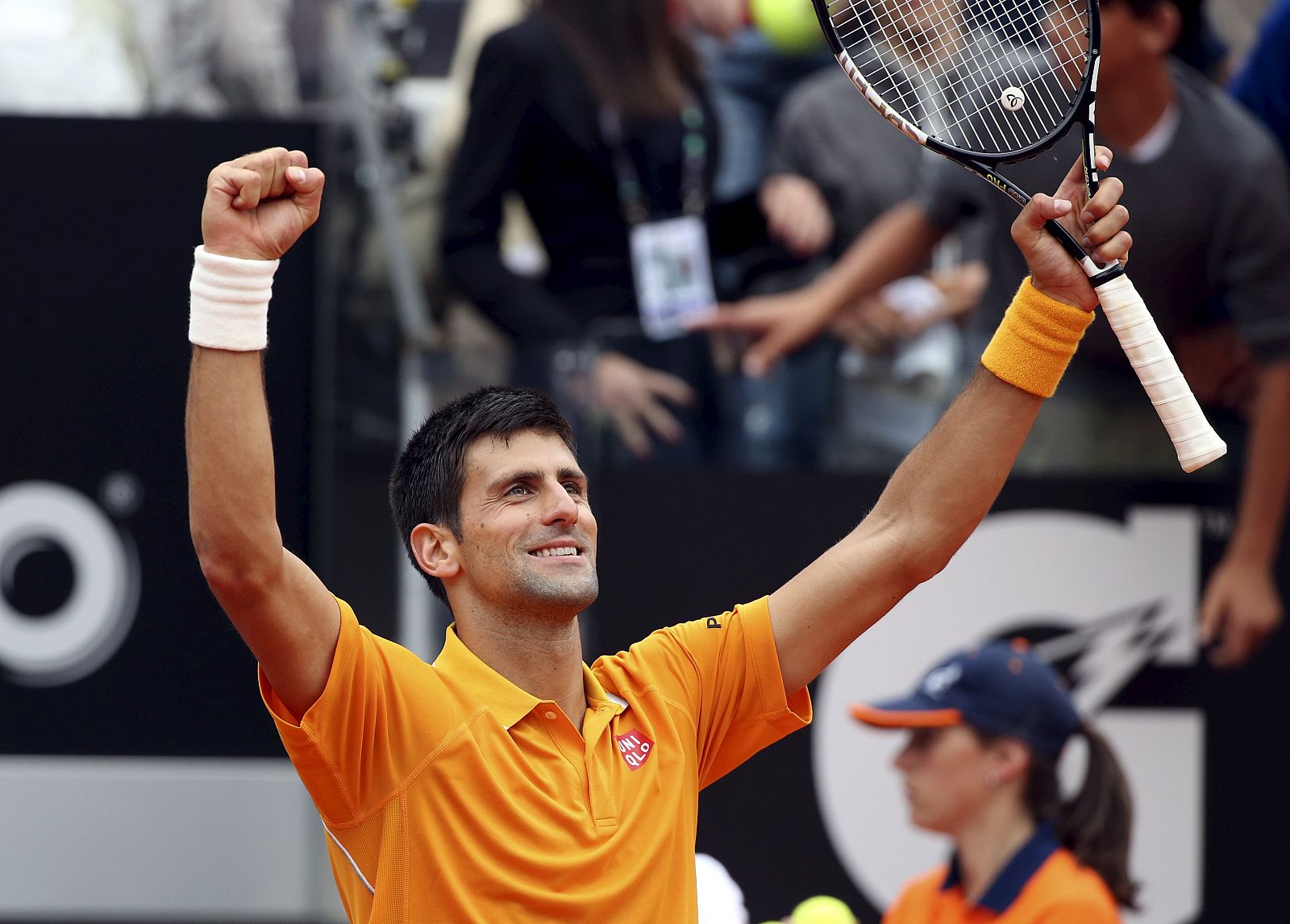 Djokovic of Serbia celebrates after winning his semifinal match against Ferrer of Spain at the Rome Open tennis tournament in Rome