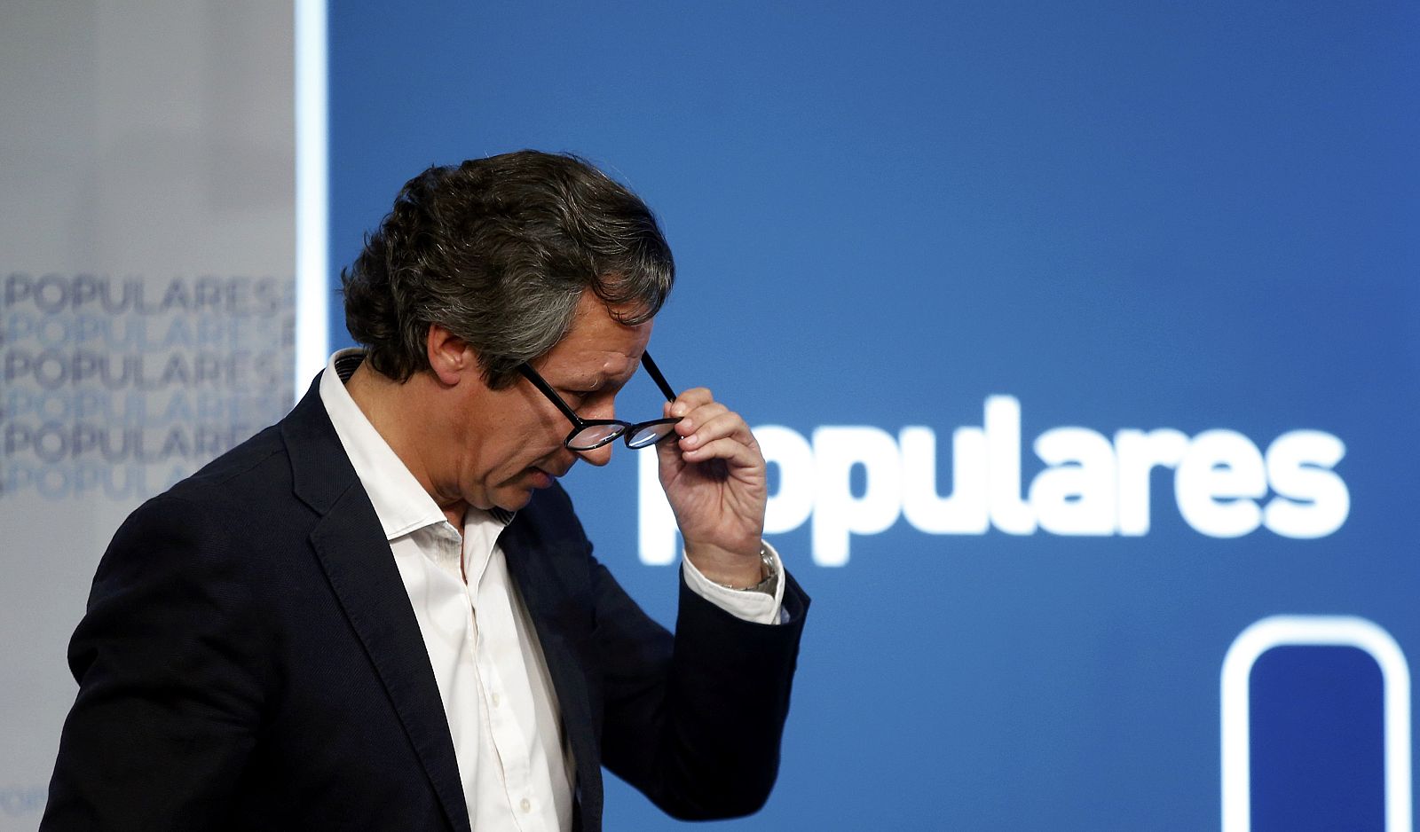 El vicesecretario de organización del PP, Carlos Floriano, tras comparecer en la sede del PP en Madrid.