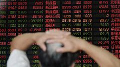 Las Bolsas chinas cierran con pérdidas una jornada muy volátil, marcada por las últimas medidas del banco central