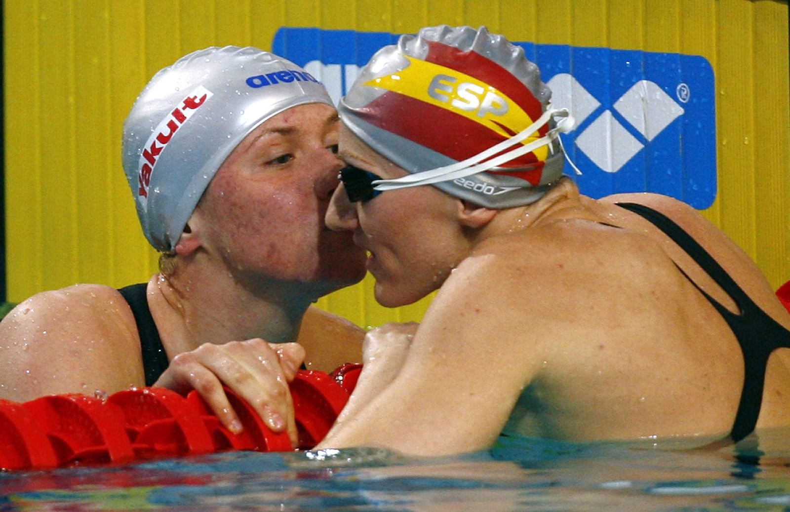 Zueva of Russia is congratulated by Zhivanevskaya of Spain after women's 50m backstroke final during European Swimming Championships in Eindhoven