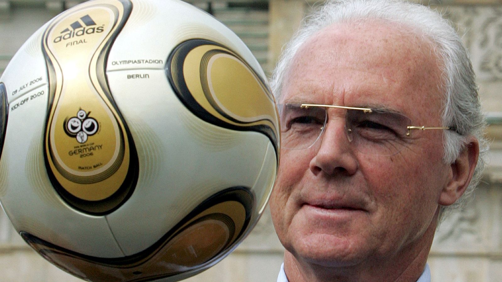 Franz Beckenbauer, President of Germany's World Cup organising committee, plays with a golden soccer ball