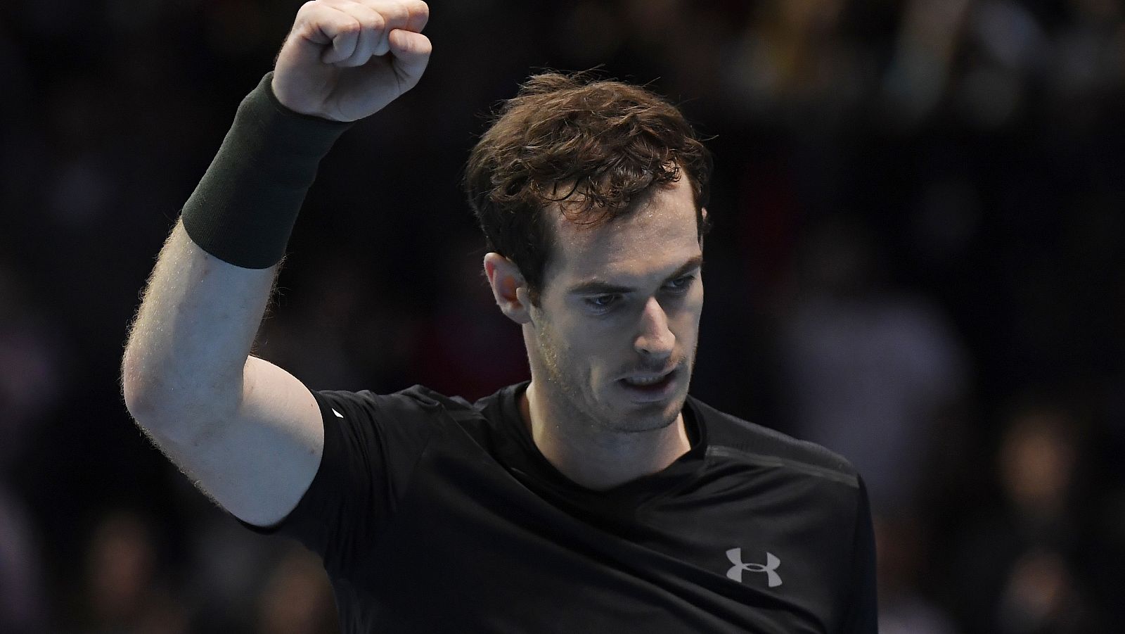 Great Britain's Andy Murray celebrates winning his round robin match against Switzerland's Stanislas Wawrinka