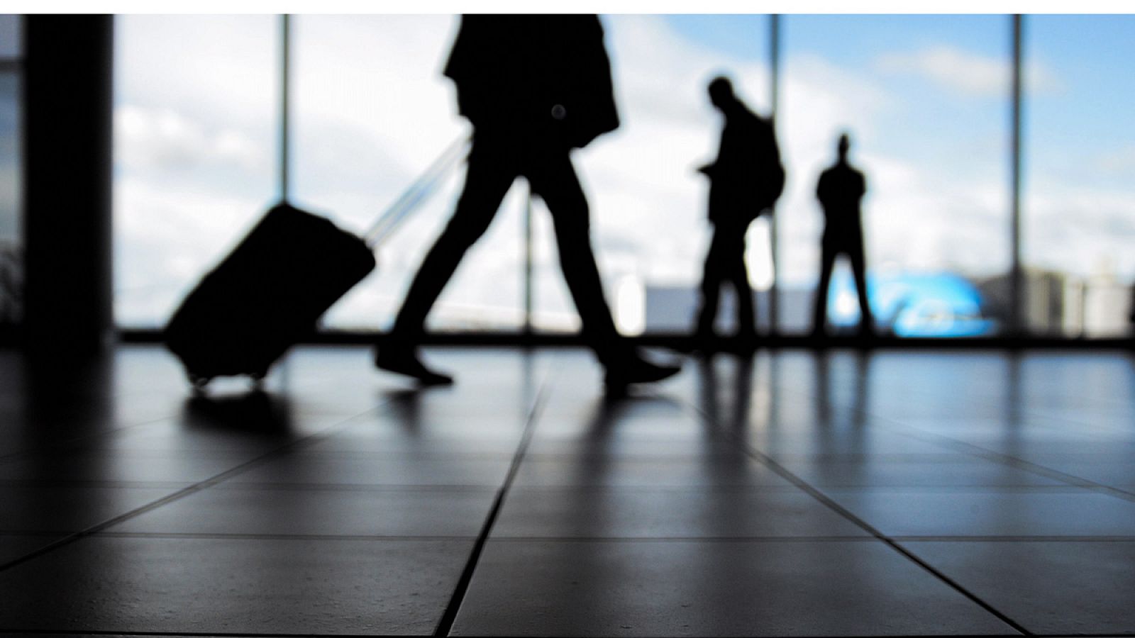 Viajeros en un aeropuerto