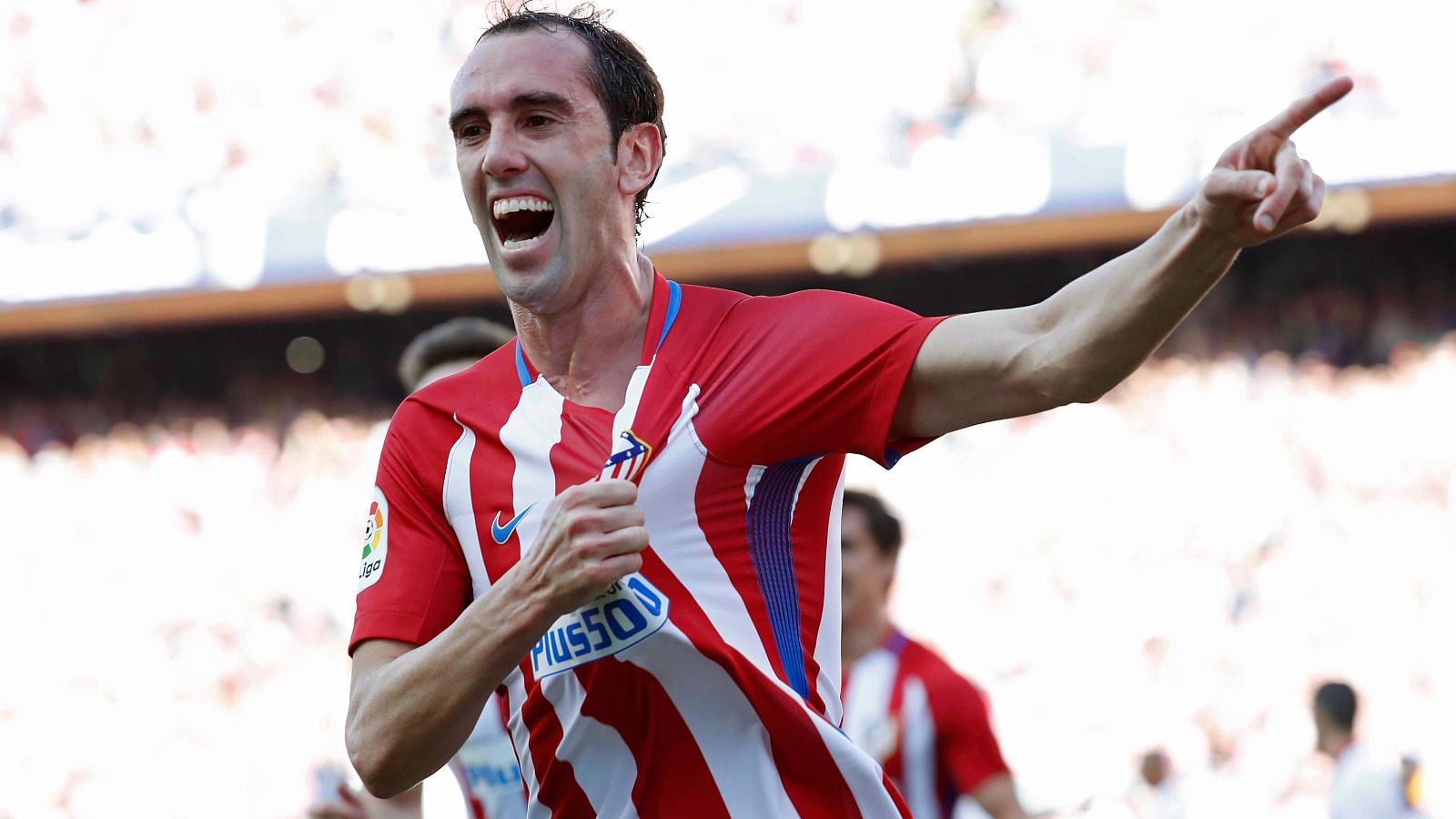 Godín celebra el primer gol ante el Sevilla