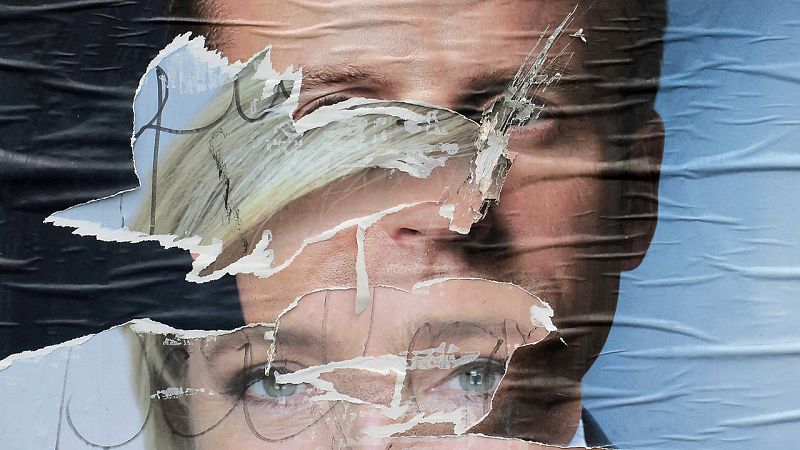 Le Pen modera su programa anti-euro y Macron promete ayudas públicas de cara a la votación definitiva 