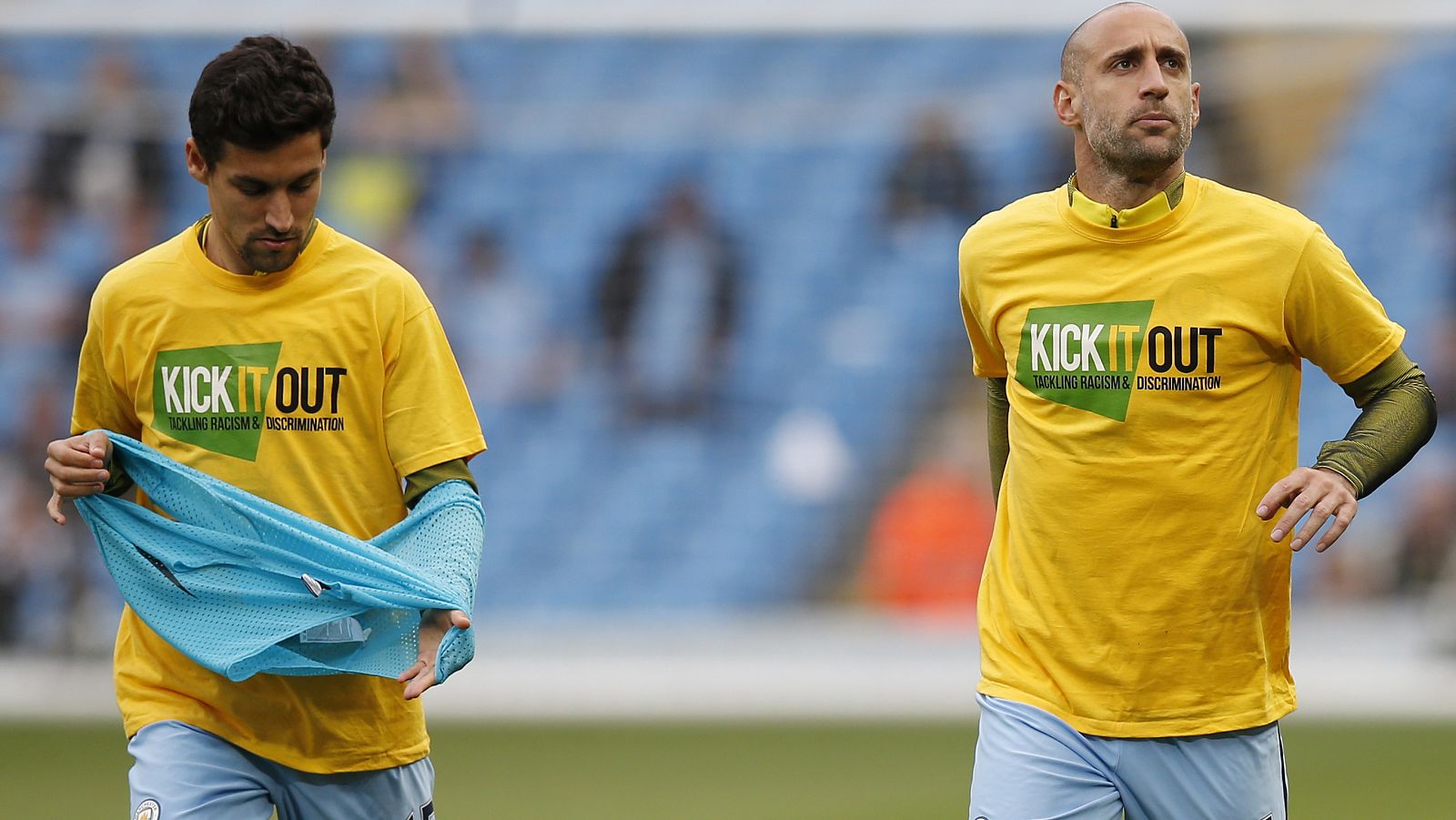Manchester City's Jesus Navas and Manchester City's Pablo Zabaleta warm up before the match