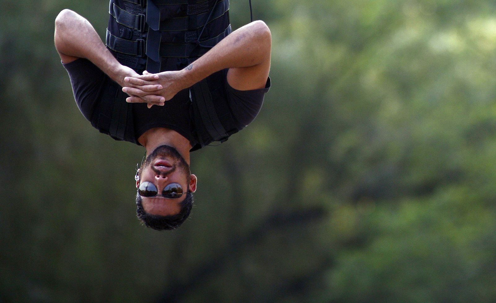 Magician David Blaine performs a stunt in Central Park in New York