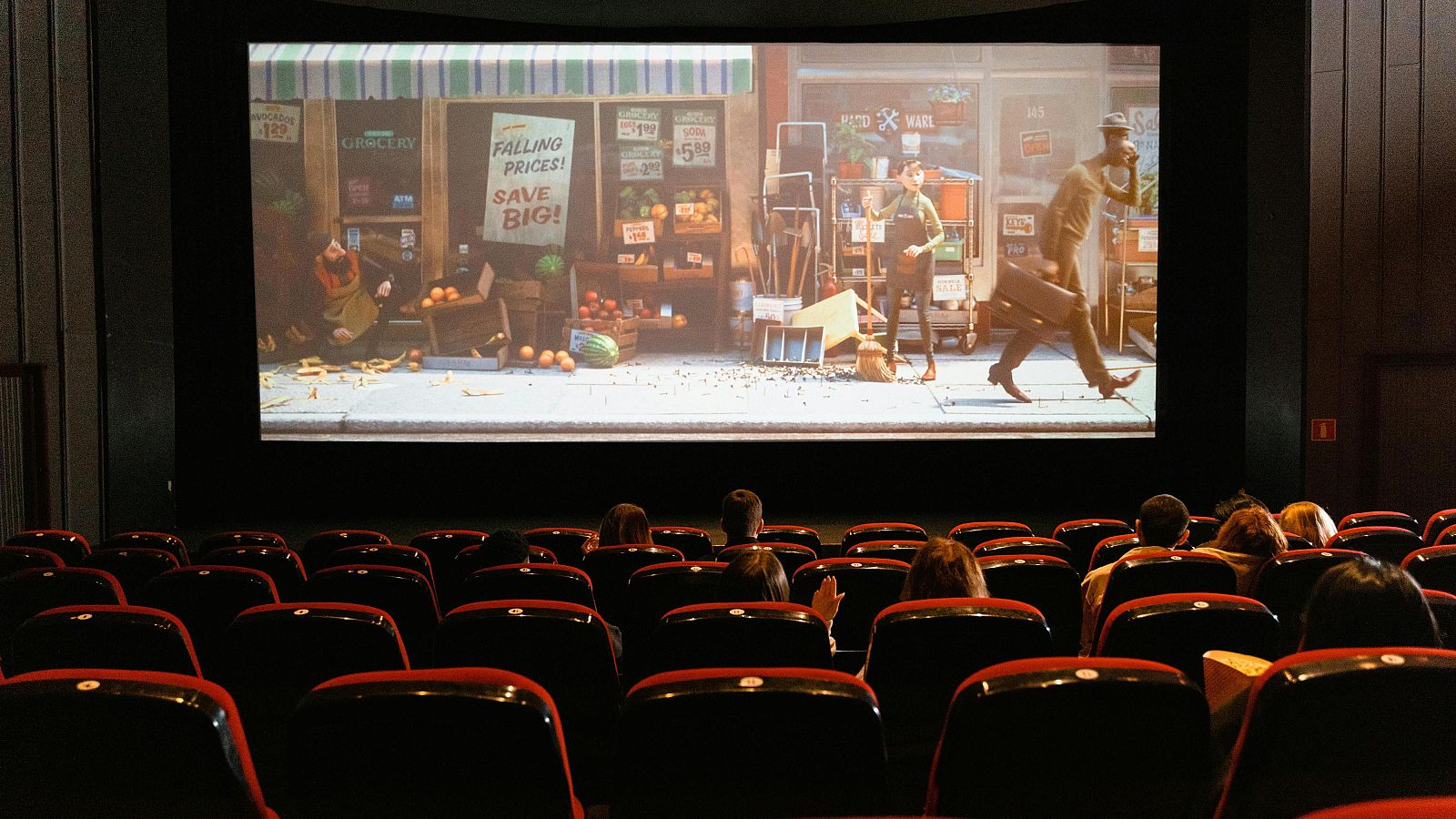 Sala de cinema on es projecta una pel·licula d'animació