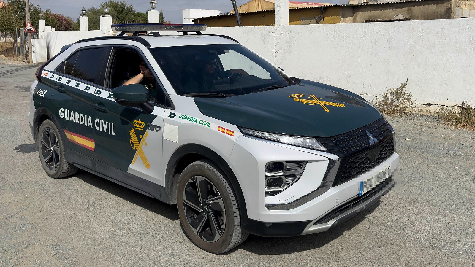 Un coche patrulla de la Guardia Civil en una zona rural.