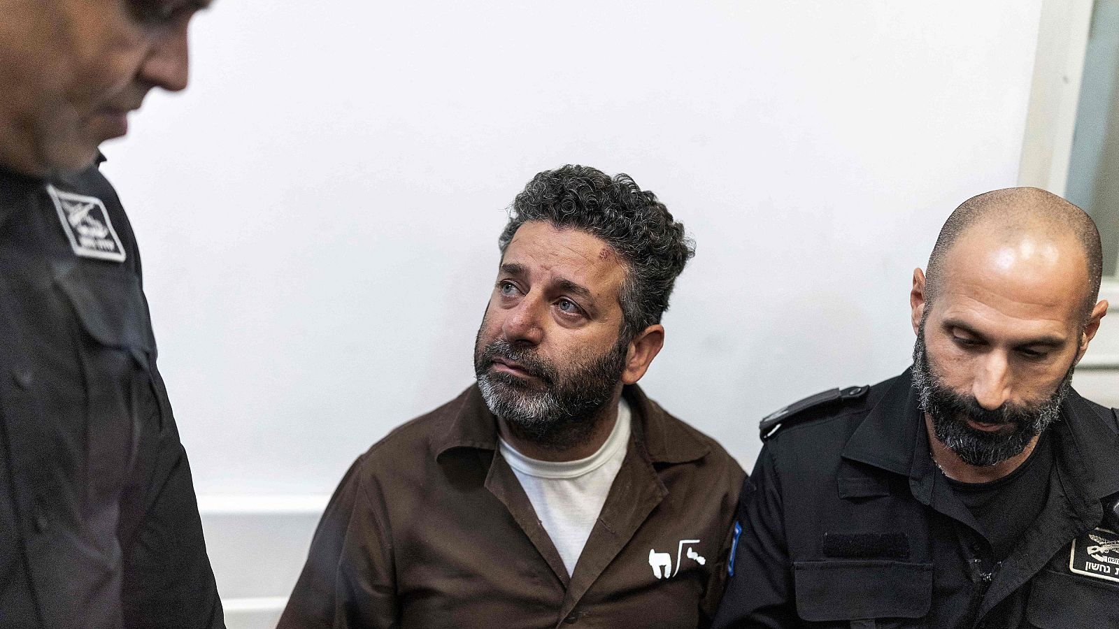 El activista hispanopalestino Abu Keshek (c)
