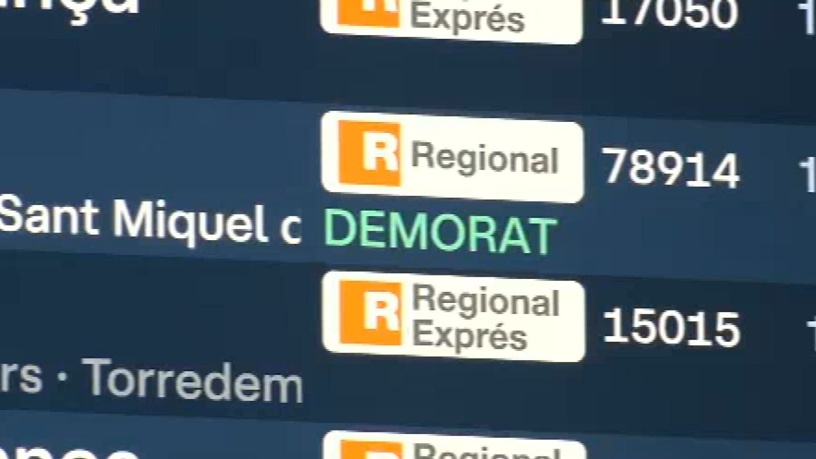 Pantalla amb informació de la circulació de trens a l'estació de Sants