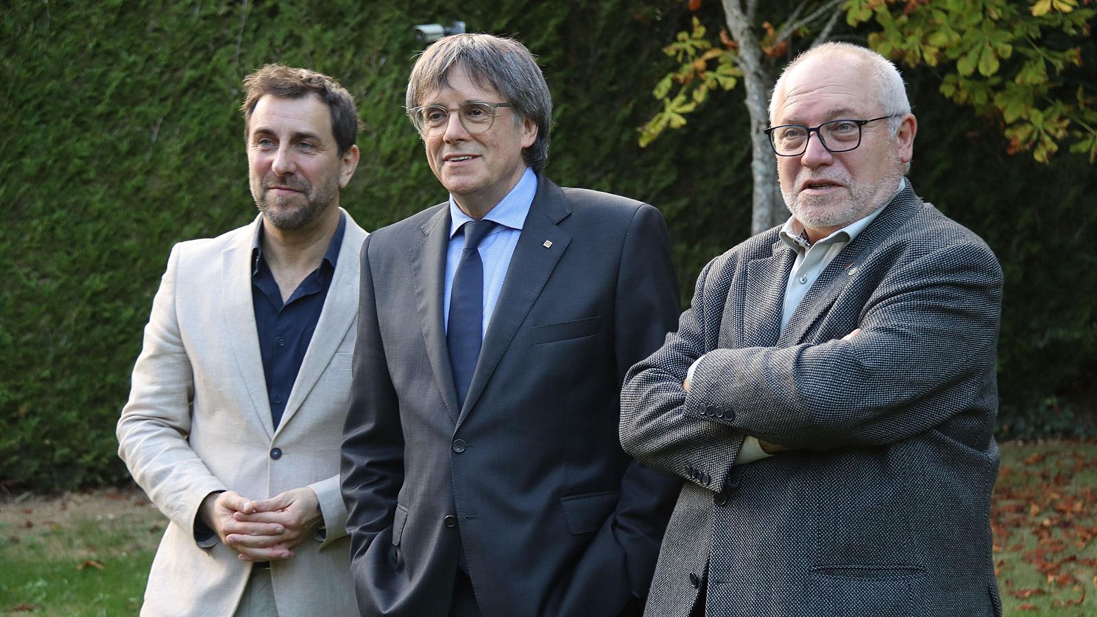 El exconseller Lluís Puig (derecha), junto al expresident Carles Puigdemont (centro) y el exconseller Toni Comín (izquierda).