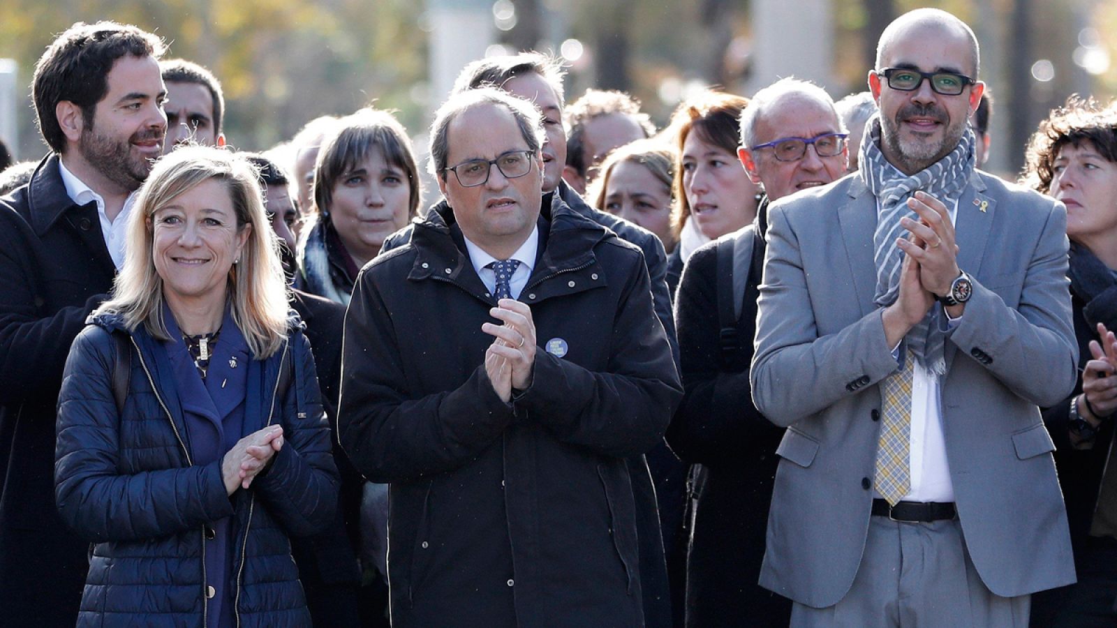 Neus Lloveras y Miquel Buch, acompañados del presidente de la Generalitat, Quim Torre, a su llegada al TSJ de Cataluña.