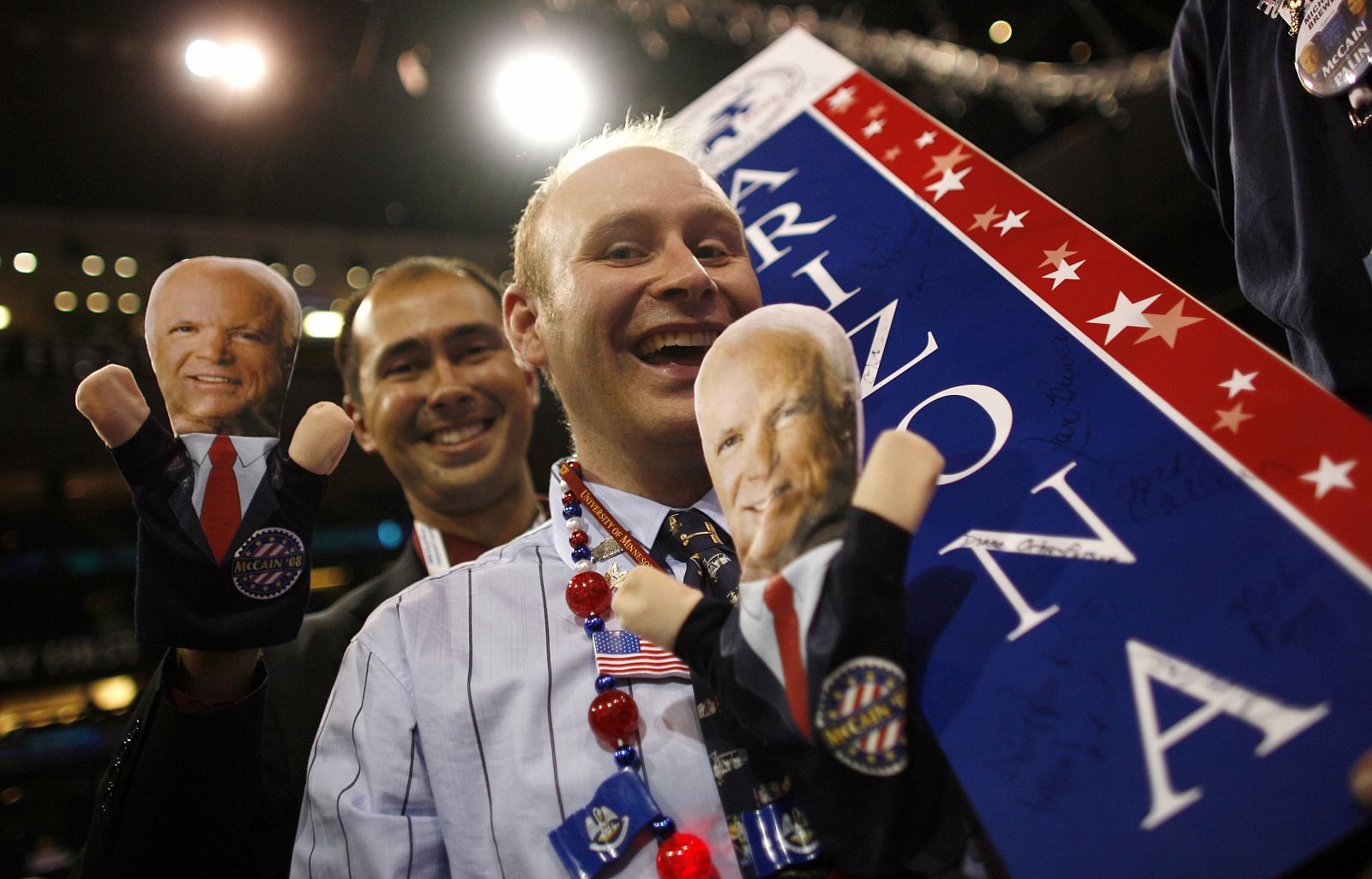 Arizona delegates hold puppets of presidential nominee Sen. McCain at Republican National Convention in St. Paul