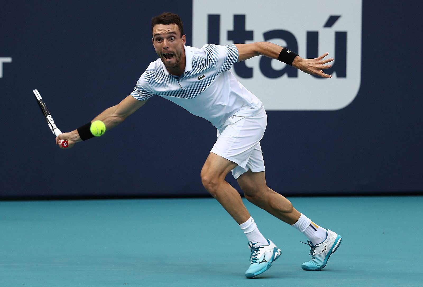 Imagen del español Roberto Bautista en su partido ante John Isner.