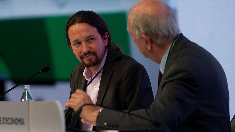 Iglesias plantea al PSOE reducir la jornada laboral y subir impuestos en una jornada con empresarios