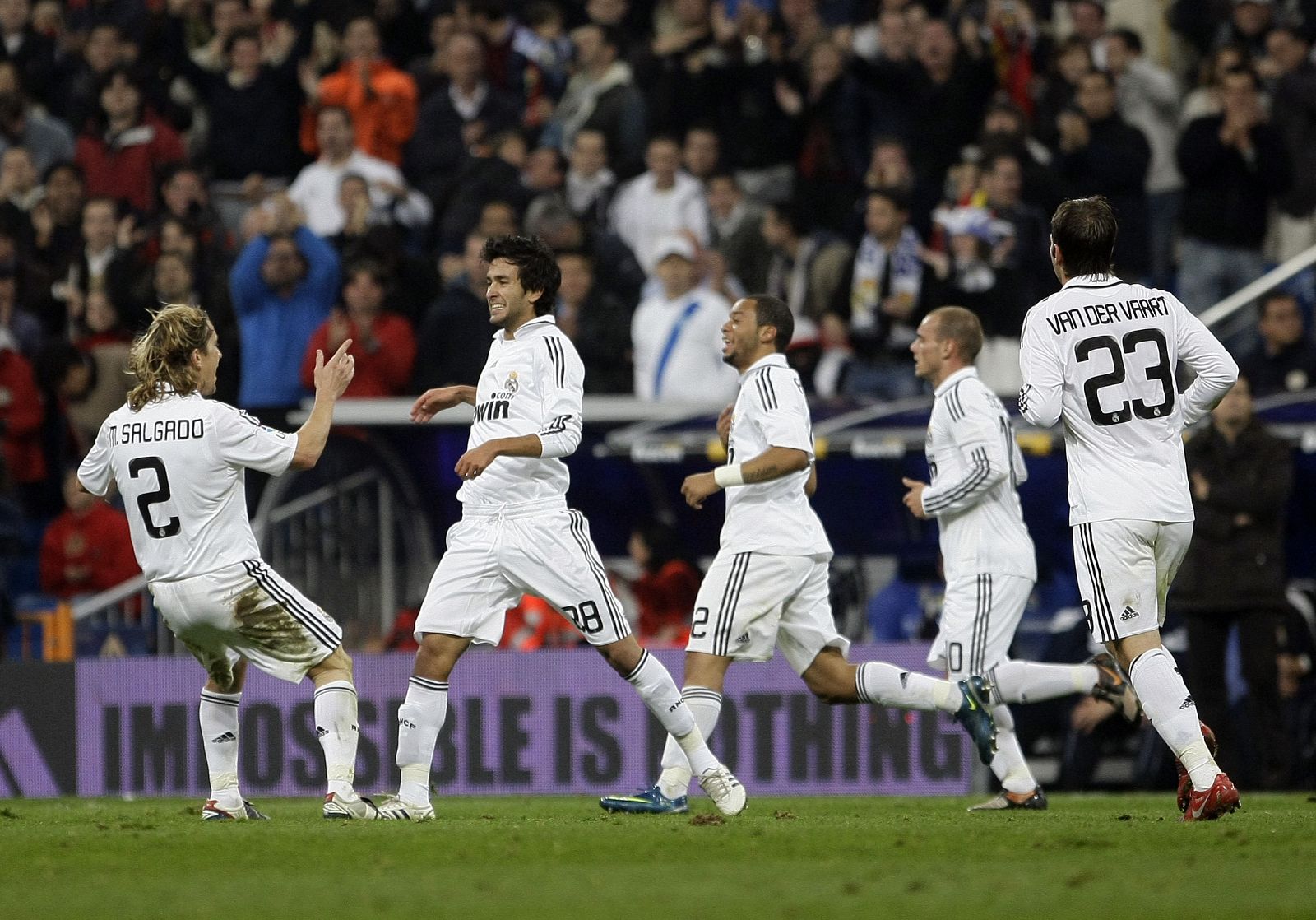 Real Madrid's Alberto Bueno celebrates goal with team mates during their Spanish King's Cup soccer match against Real Union Club at the Santiago Bernabeu stadium in Madrid