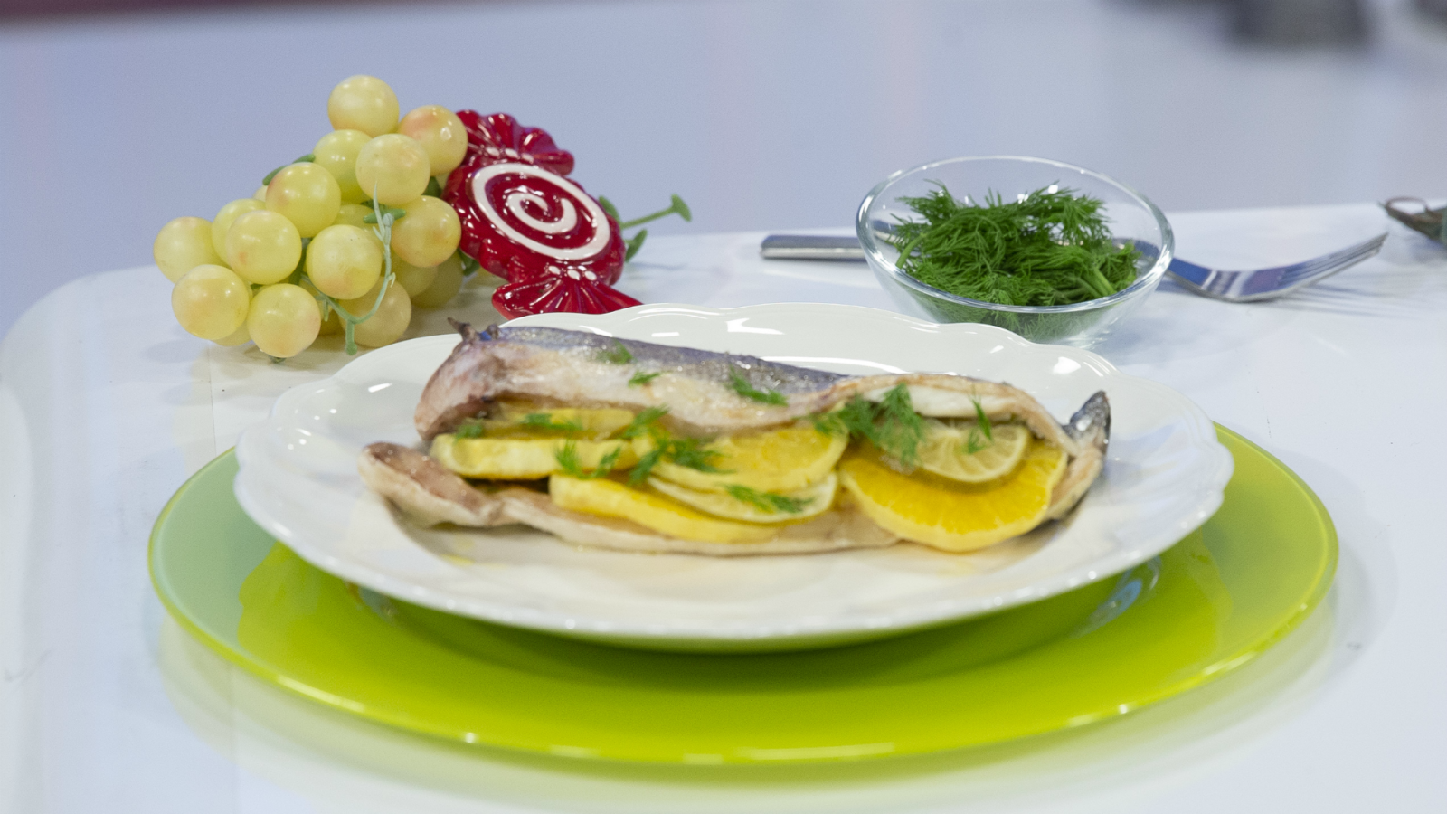 3. Lubina en papillote con salsa de cítricos y eneldo