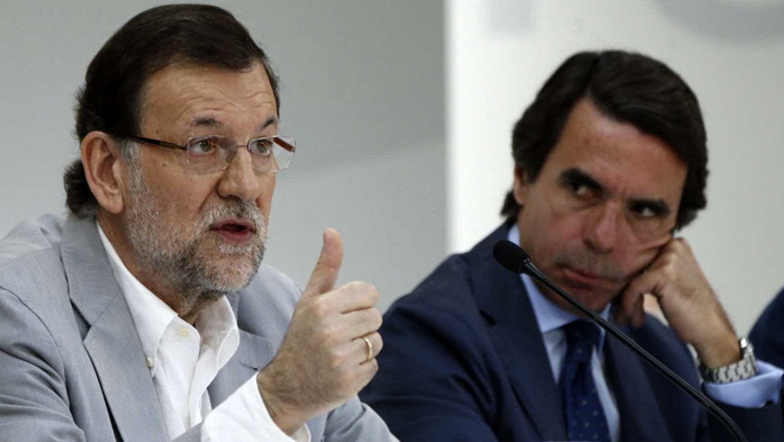 Mariano Rajoy y José María Aznar