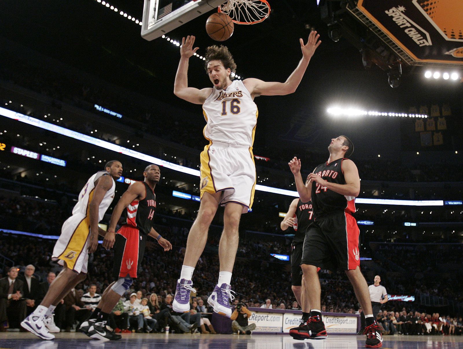 Los Angeles Lakers Pau Gasol of Spain slam dunks against the Toronto Raptors during their NBA basketball game in Los Angeles