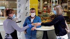 La vuelta a los cafés y a las tiendas de siempre: la mitad de España reabre a medio gas y con incertidumbre