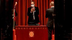 Torra vuelve al Parlament tras su destitución para denunciar un "golpe de Estado" contra Cataluña