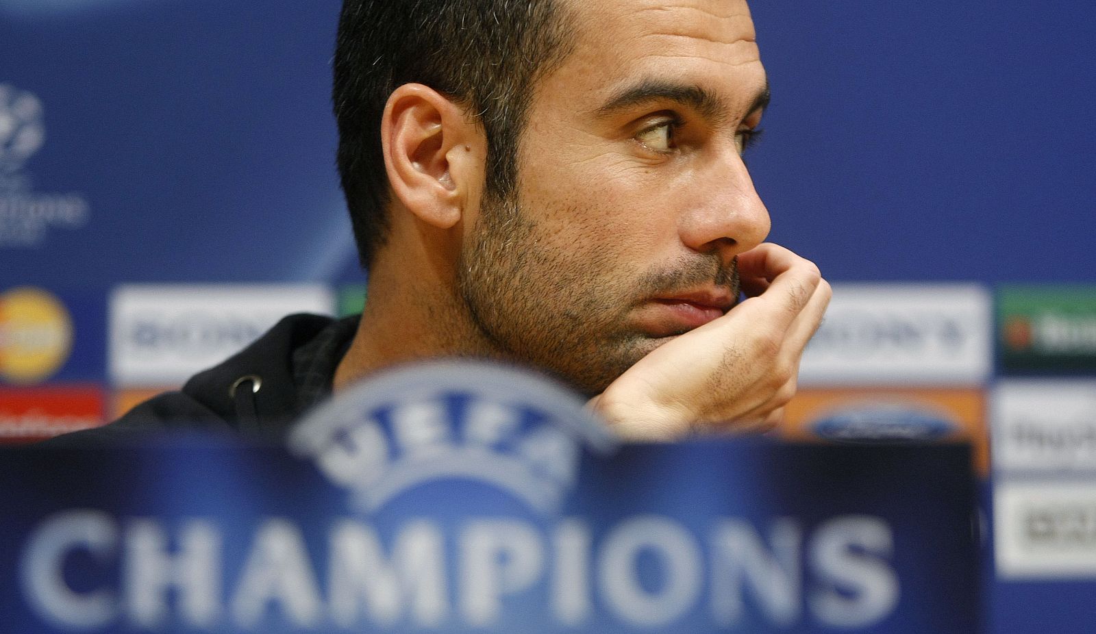 Barcelona's coach Pep Guardiola attends a news conference at Camp Nou stadium in Barcelona
