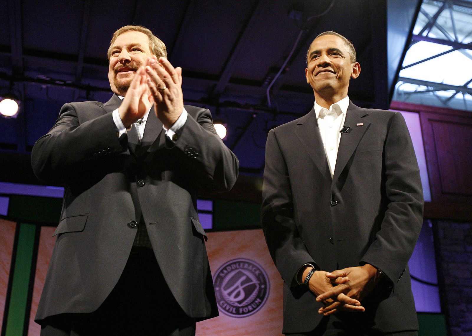 Barack Obama stands next to Rick Warren at the Civil Forum on the Presidency at Saddleback Church in Lake Forest