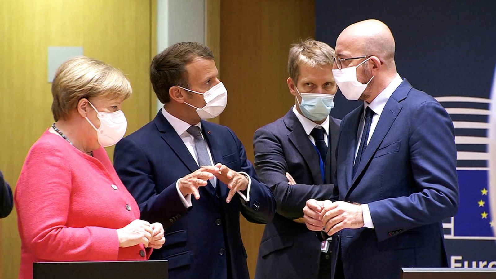 Merkel, Macron, Michel y un asesor