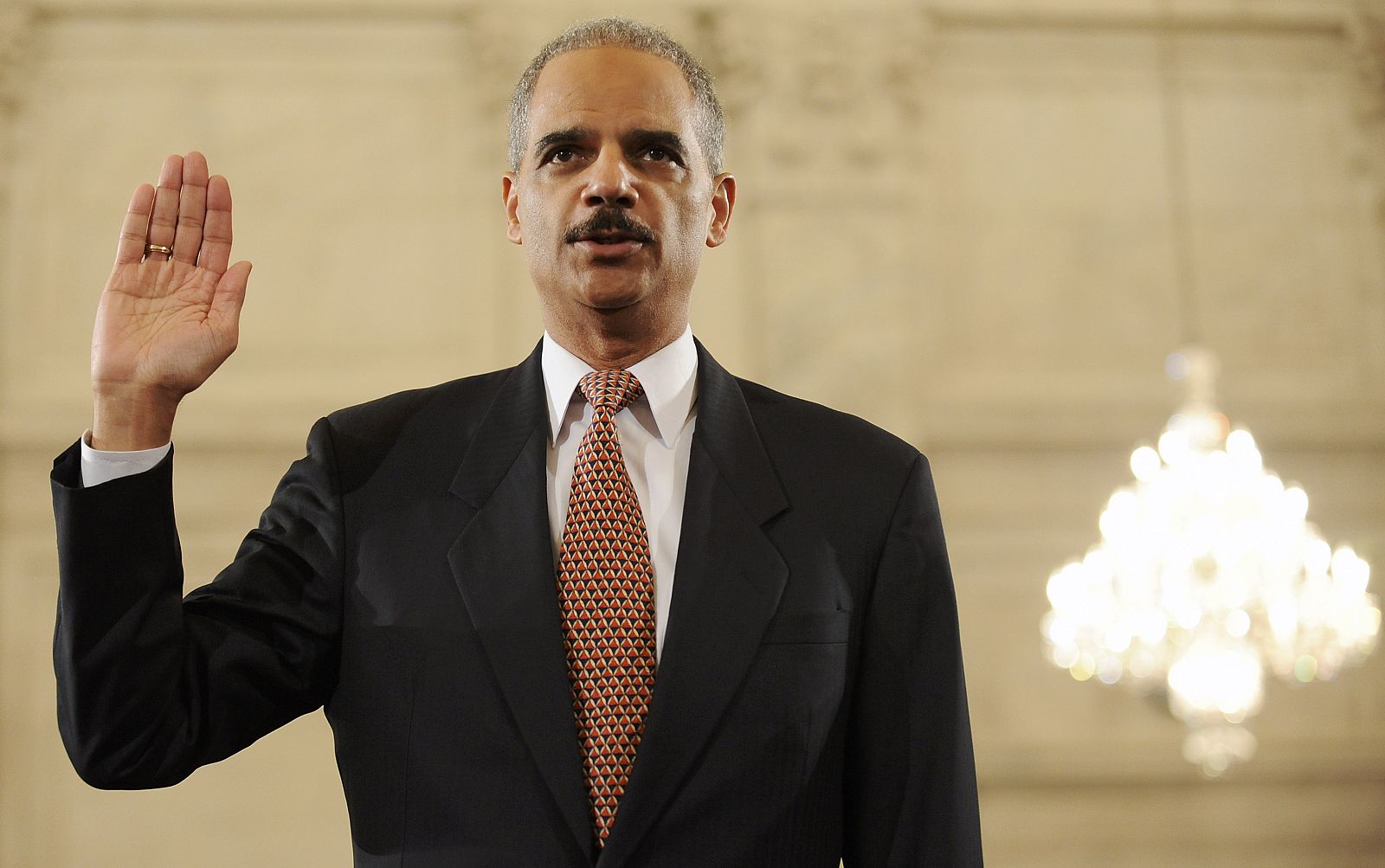 Holder is sworn in at the beginning of his confirmation hearing before the Senate Judiciary Committee on Capitol Hill in Washington