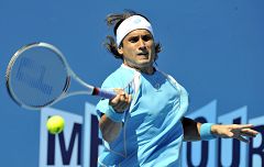 Ferrer y Robredo pasan a segunda ronda en Australia; Feliciano y Moyá pierden