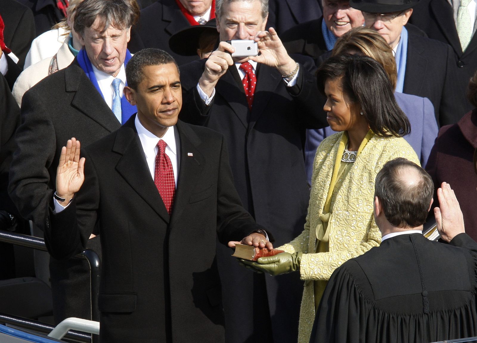Barack Obama takes the Oath of Office as the 44th president of the United States from U.S. Chief Justice John Roberts during the inauguration ceremony in Washington