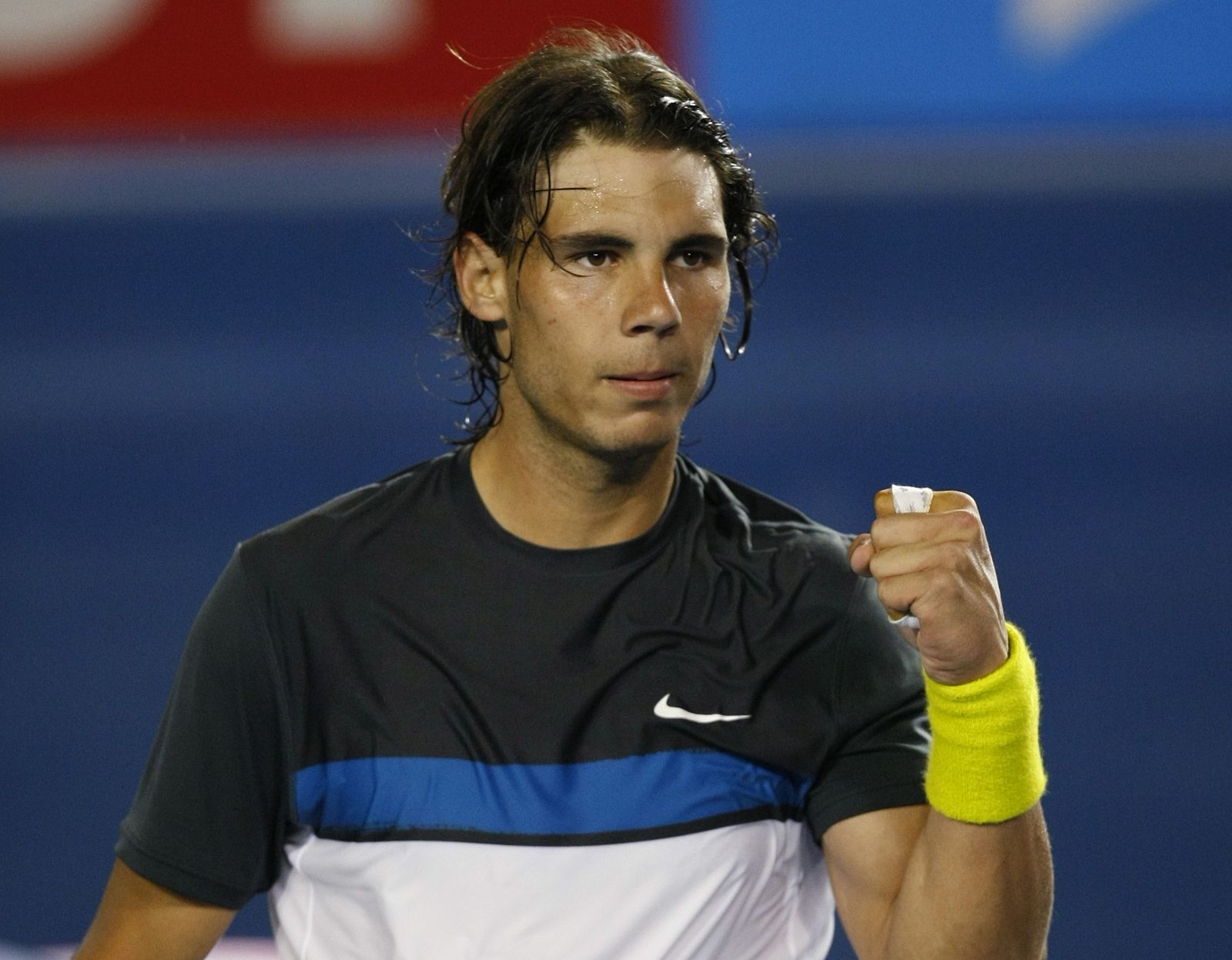 Rafa Nadal celebra su triunfo ante el belga Rochus, en el Abierto de Australia